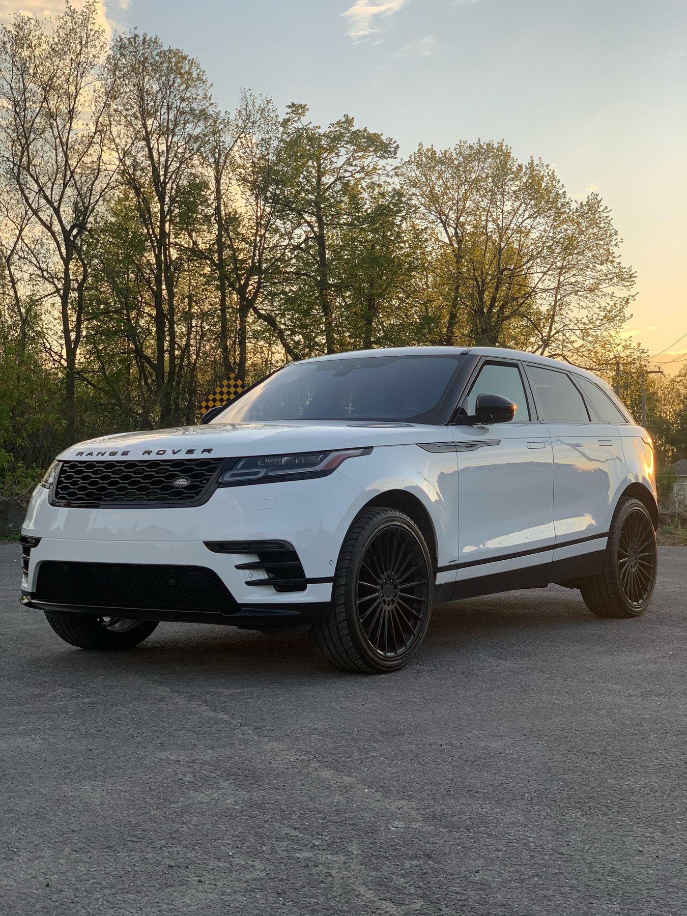 White Range Rover Velar at sunset